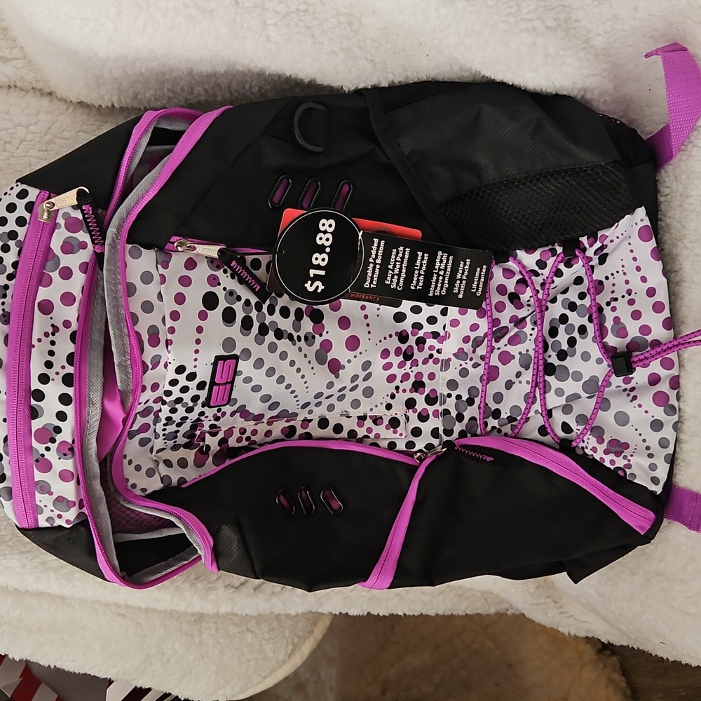 Backpack by Eastsport with pockets everywhere.
